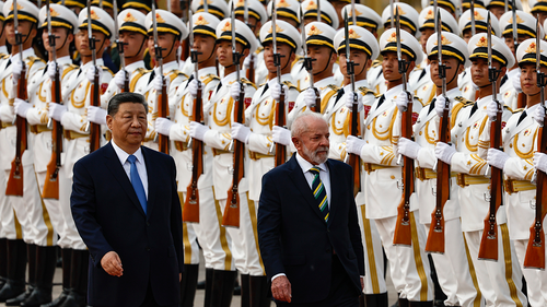 Chinese President Xi Jinping and Brazil's President Luiz Inacio Lula da Silva walk past the honor guard during a welcome ceremony at the Great Hall of the People in Beijing, China on May 13, 2025.