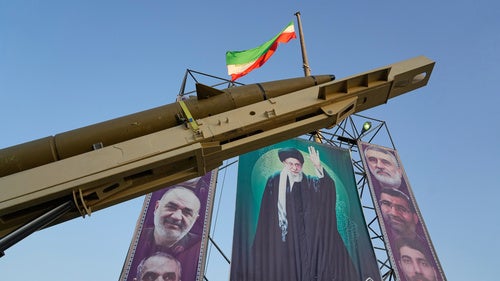 an Iranian missile and flag