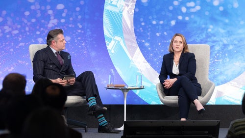 Speakers on the Council's stage.