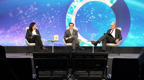 Speakers on the Council's stage