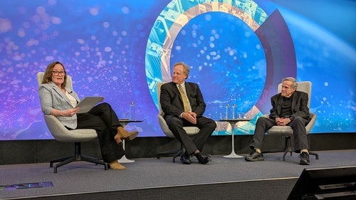 Speakers on the Council's stage