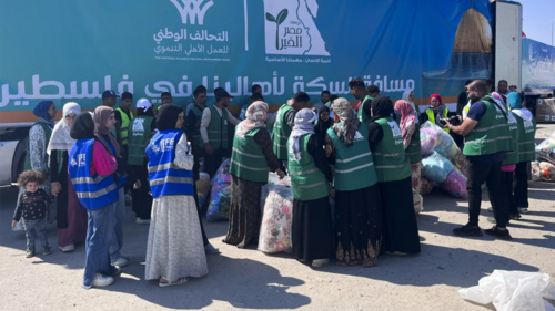 Humanitarian aid convoy for the Gaza Strip is parked in Arish, Egypt