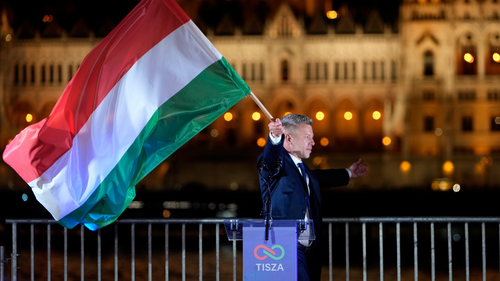 Péter Magyar waves a Hungarian flag after winning the parliamentary elections a parliamentary election in Budapest, Hungary on April 12, 2026.