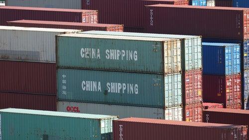 China Shipping containers sit stacked up at the Long Beach Container Terminal