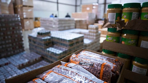 Food items wait to be packaged and distributed at a Feeding America food bank