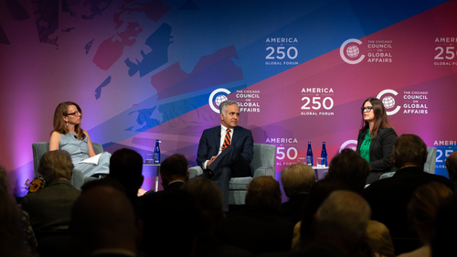 Panel of speakers on a stage
