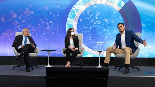 Speakers on the Council's event stage