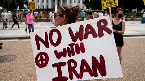 Demonstrators rally outside the White House to protest US military action in Iran