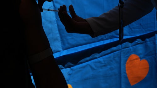 A health worker administers a dose of the measles vaccine in Chapultepec Park in Mexico City, Sunday, Feb. 8, 2026.