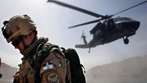 Blackhawk helicopter taking off from an operating base.