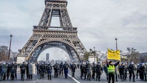 Yellow vest demonstrations in Paris, Eiffel Tower stands in the background