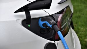 Electric car being charged