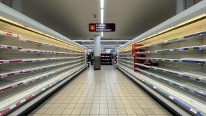 A London grocery store with empty shelves during the COVID-19 pandemic