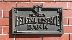 Member of the Federal Reserve Bank plaque outside a bank