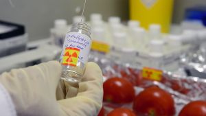 A scientist working in a food and environmental testing laboratory