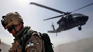 Blackhawk helicopter taking off from an operating base.