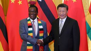 Picture of Xi shaking hands with an African leader. 