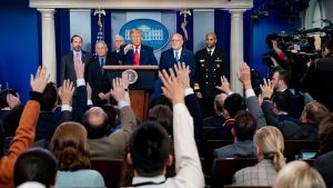 President Trump, joined by Vice President Pence, left, takes questions from reporters during a Coronavirus Task Force update at the White House, Feb. 29, 2020.