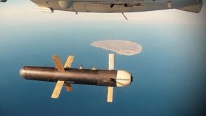 An Iranian Shahed 171 drone dropping a bomb as part of a military exercise in the Gulf, in Iran, in this undated handout photo.