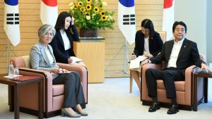 South Korea's Foreign Minister Kang Kyung-wha meets with Japan's Prime Minister Shinzo Abe at Abe's official residence in Tokyo