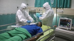 Man laying in hospital bed