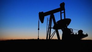 A pump jack in an oil field. 