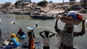 Women carry laundry on the border of Ethiopia and Somalia 