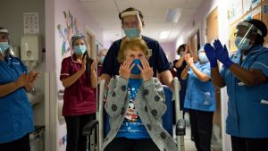 Margaret Keenan celebrates after receiving the world's first COVID-19 vaccine 