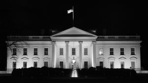 An image of the White House seen at night. 