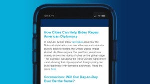 A smartphone with the Global Cities Insights newsletter on the screen.