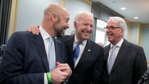 Board member Chris Keogh, Vice President Joe Biden, and Council President Ivo Daalder