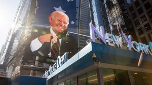 Large billboard of Joe Biden outside the NYPD office in Times Square.