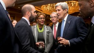 Members of the YP Network meet John Kerry after an event.