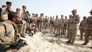 Admiral Ali Saeed Al Shehri speaks with soldiers during mixed maritime exercise with U.S. Navy and Saudi Royal Navy, at Saudi Military Port, Ras Al Ghar, Eastern Province, in Jubail