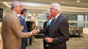 Samuel C. Scott III and Ivo Daalder shake hands