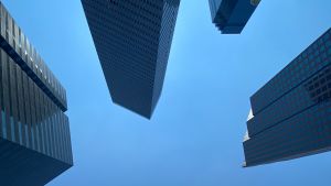 View from the ground of four modern skyscrapers