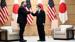 Secretary of State Pompeo bumps fists with Japanese Prime Minister Suga