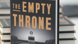 The Empty Throne hardcover book on a table