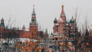 View of the Kremlin and St. Basil's Cathedral in Moscow, Russia during winter.