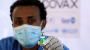 A nurse displays the AstraZeneca/Oxford vaccine under the COVAX scheme against the coronavirus disease (COVID-19) at the Eka Kotebe General Hospital in Addis Ababa, Ethiopia.