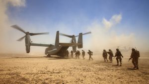 US trips board a military plane in Afghanistan