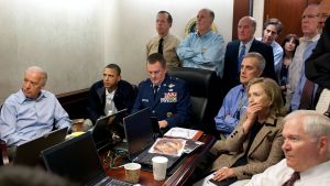  U.S. President Barack Obama and Vice President Joe Biden, along with members of the national security team, receive an update on Operation Neptune Spear, a mission against Osama bin Laden, in one of the conference rooms of the Situation Room of the White House, May 1, 2011. They are watching live feed from drones operating over the bin Laden complex.