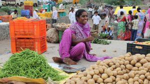 A woman with potatoes 