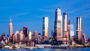 View of the New York City skyline with a blue sky