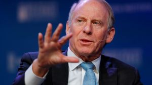 Richard Haass speaking on-stage at an event