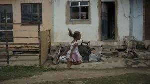A girl jumps rope in the City of God slum in Rio de Janeiro