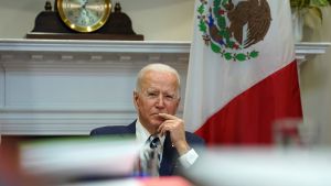 President Biden listens during virtual meeting with Mexican President Andres Manuel Lopez Obrador from the White House