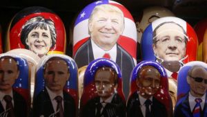 Matryoshka dolls, or Russian nesting dolls, bearing the faces of President Trump and Russian President Vladimir Putin, among other world leaders, are displayed for sale at a souvenir shop in central Moscow.