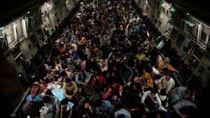 Refugees in a military aircraft in Kabul