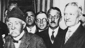A black and white photo of several men, including Georges Clemenceau.